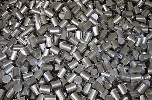 Heap of cans, symbolizing unrestrained consumption, outside the South Korea Pavilion of Expo 2015 in Milan.