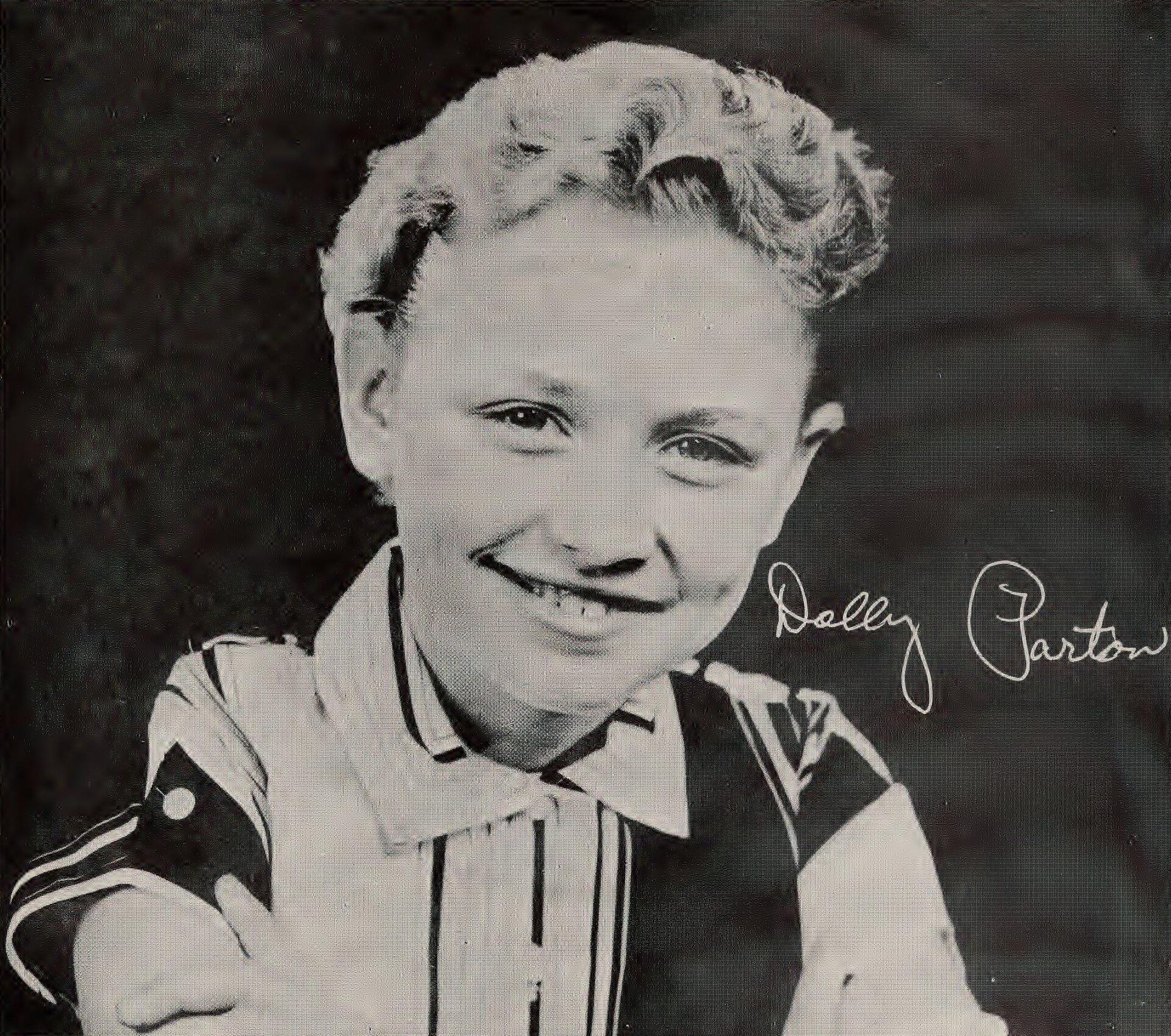 Publicity photo of Dolly Parton at age 12 first published in a 1959 sleeve by Goldband Records; scan depicts a 1970s reissue.